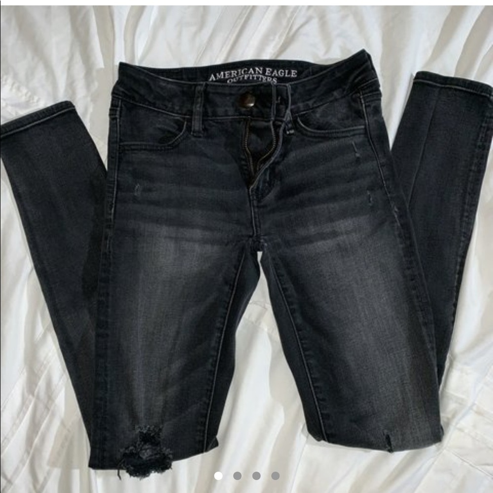 black ripped american eagle jeans